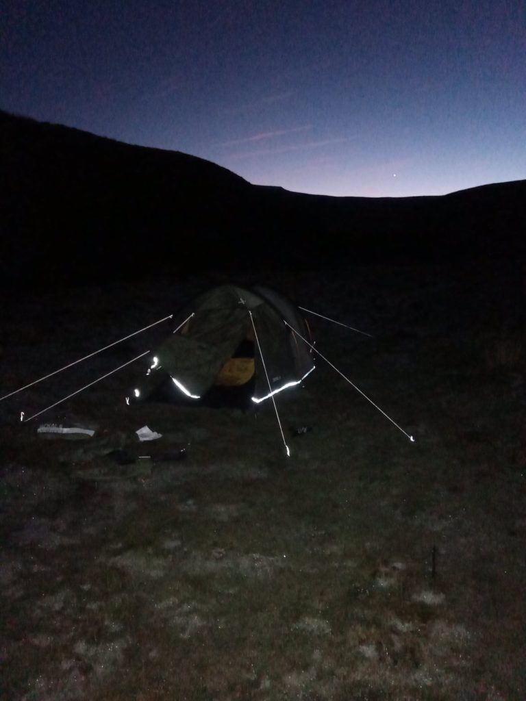 sunset with tent