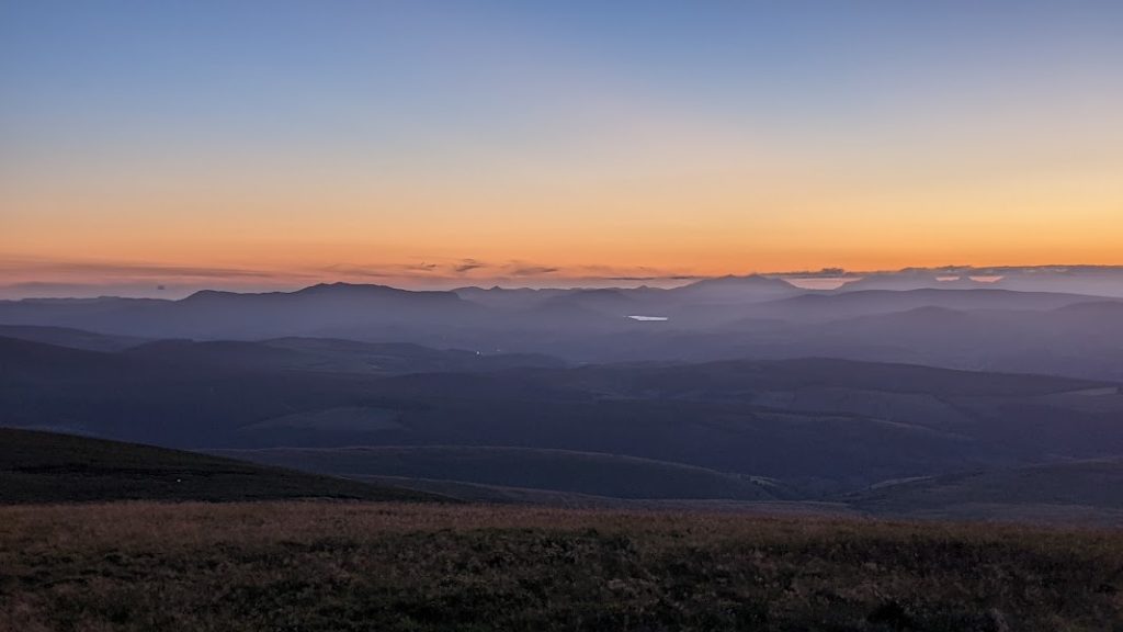 View over Snowdonia at sunset.